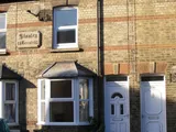 A GOOD SIZE TWO BEDROOM HOUSE WITH DOUBLE GLAZING, GAS FIRED CENTRAL HEATING AND GARDENS