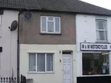 A CENTRALLY SITUATED & UNEXPECTEDLY SPACIOUS THREE BEDROOM HOUSE WITH GARAGE & NO ONGOING CHAIN