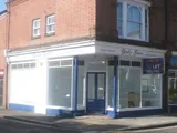 PROMINENT CORNER SHOP