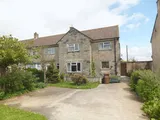 Set within a desirable village location is this well proportioned 3 bedroom family home with driveway parking, rear gard